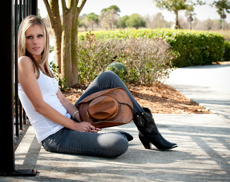 Woman Sitting on Pavement — White, Relaxed