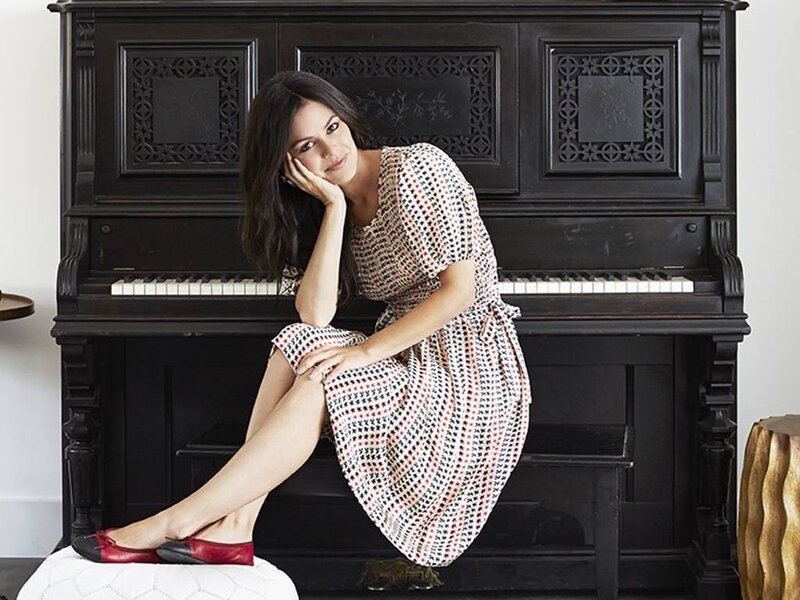 Woman Sitting on Piano — Black, Relaxed