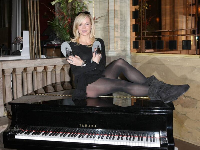 Woman Sitting on Piano — Black