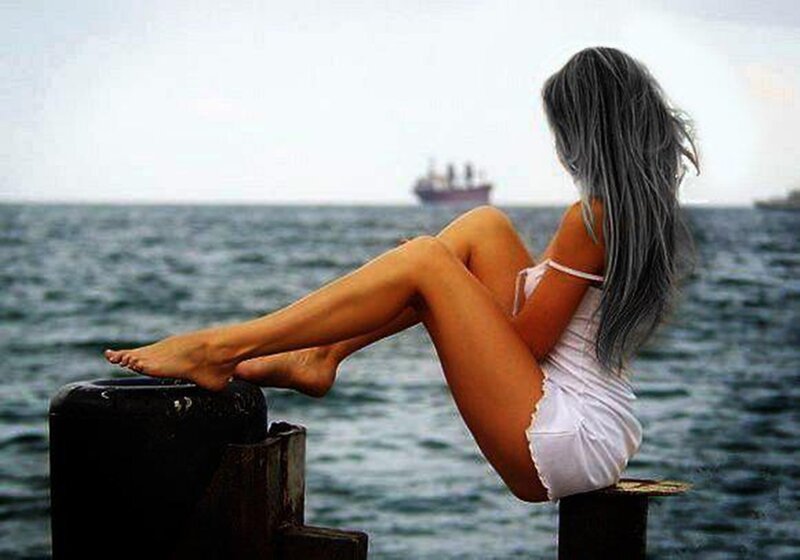 Woman Sitting on Pier — Blue, Calm