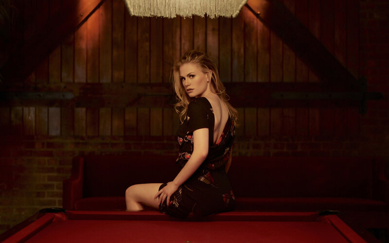 Woman Sitting on Pool Table — Red, Dramatic