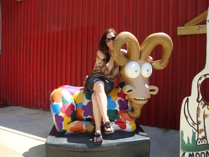 Woman Sitting on Ram Statue