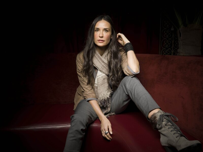 Woman Sitting on Red Couch — Dramatic, Photograph