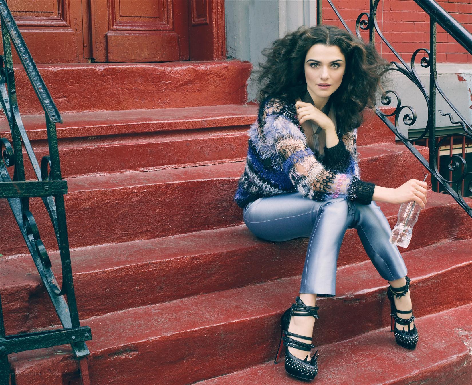 woman sitting on red steps