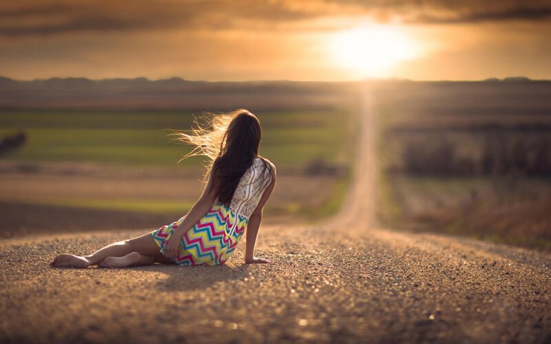 Woman Sitting on Road — Brown, Serene