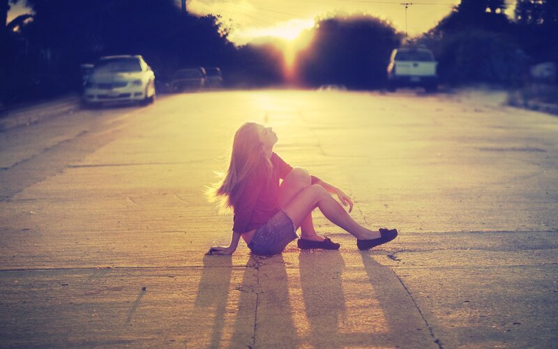 Woman Sitting on Road — Yellow, Dramatic, Sunset