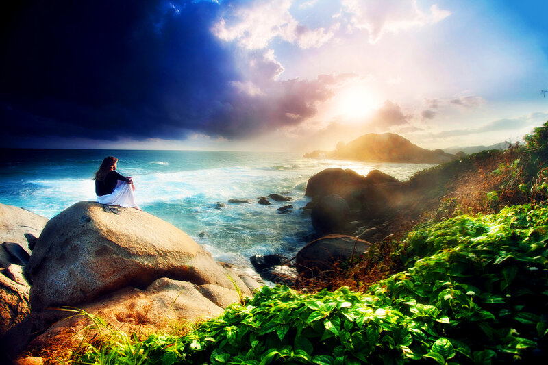 Woman Sitting on Rock — Blue, Dramatic, Sunset, Photograph