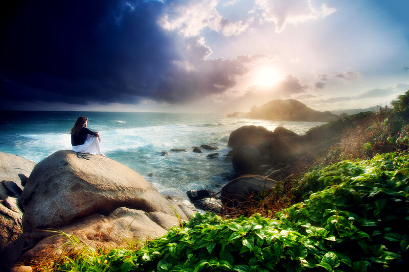Woman Sitting on Rock — Blue, Dramatic