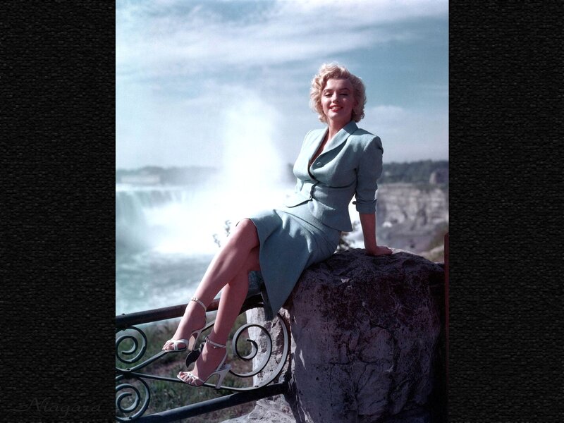 Woman Sitting on Rock — Blue, Serene, Afternoon, Photograph