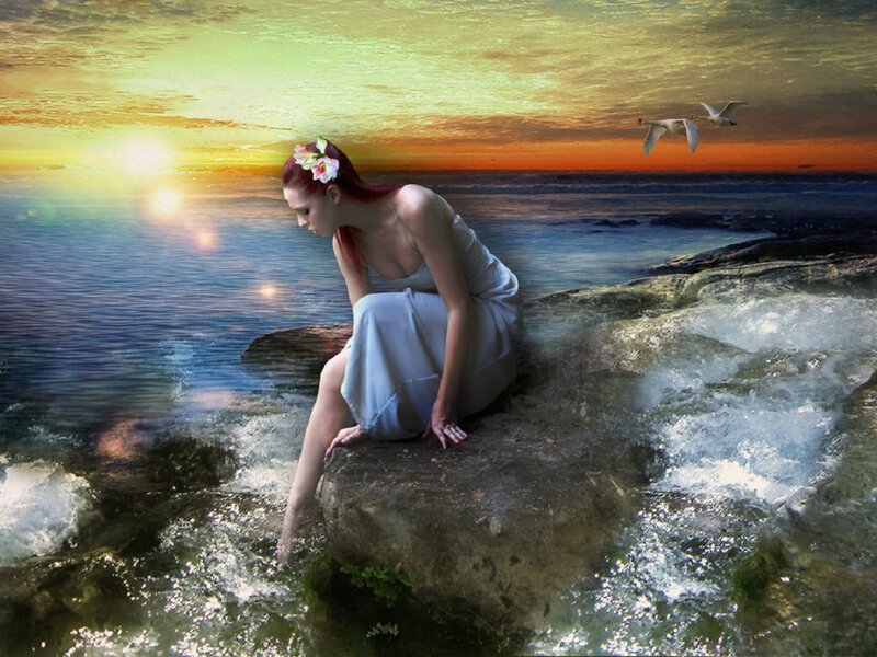 Woman Sitting on Rock — Blue, Serene, Sunset