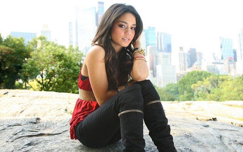 Woman Sitting on Rock — Red
