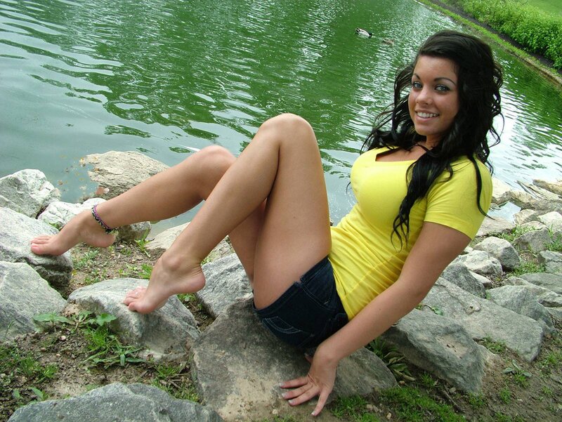 Woman Sitting on Rocks — Yellow, Relaxed