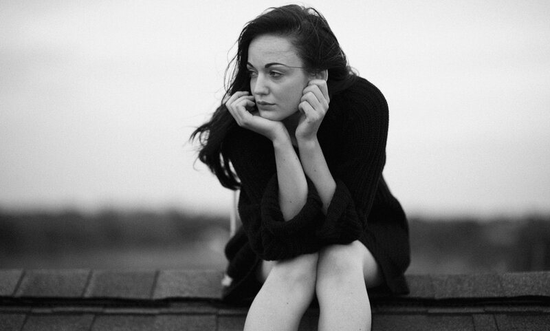 Woman Sitting on Roof — Black