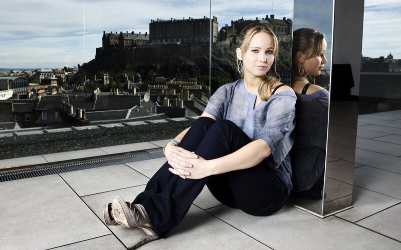 Woman Sitting on Rooftop — Blue, Calm, Afternoon, Photograph, Castle