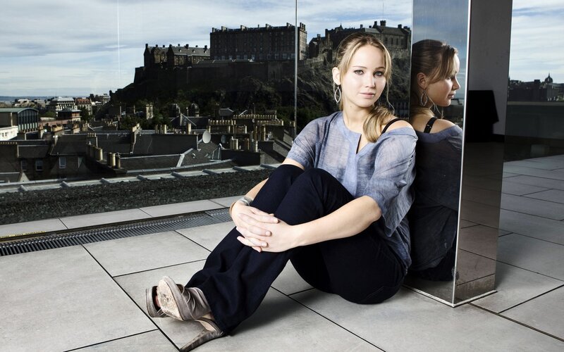 Woman Sitting on Rooftop — Blue, Calm, Afternoon