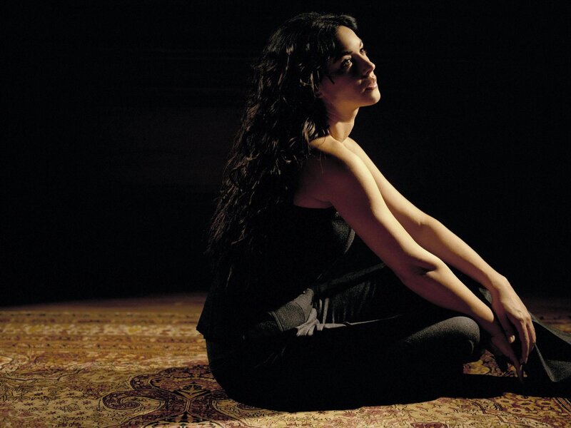 Woman Sitting on Rug — Black, Dramatic