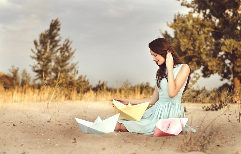 Woman Sitting on Sand — Blue