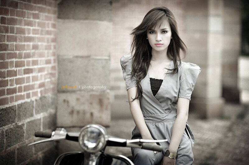 woman sitting on scooter