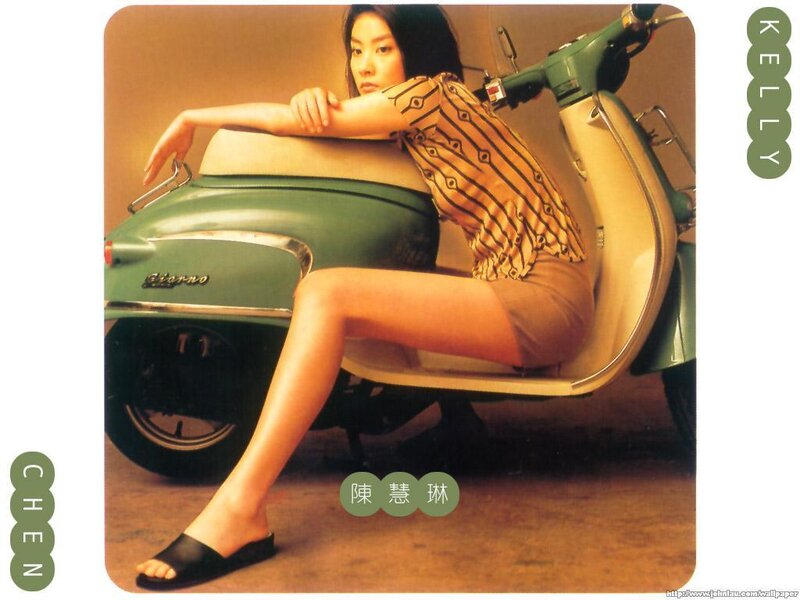 woman sitting on scooter