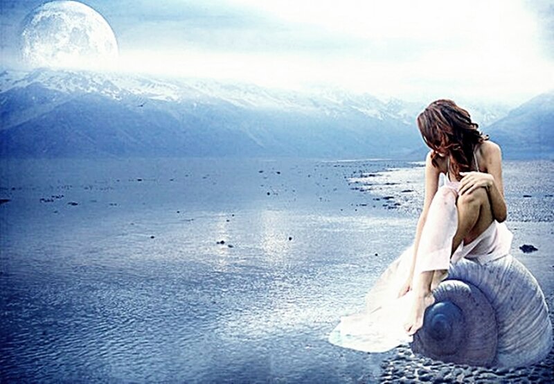 Woman Sitting on Seashell