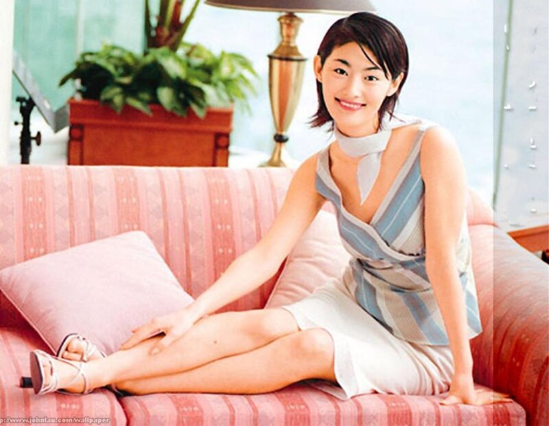 Woman Sitting on Sofa — Pink