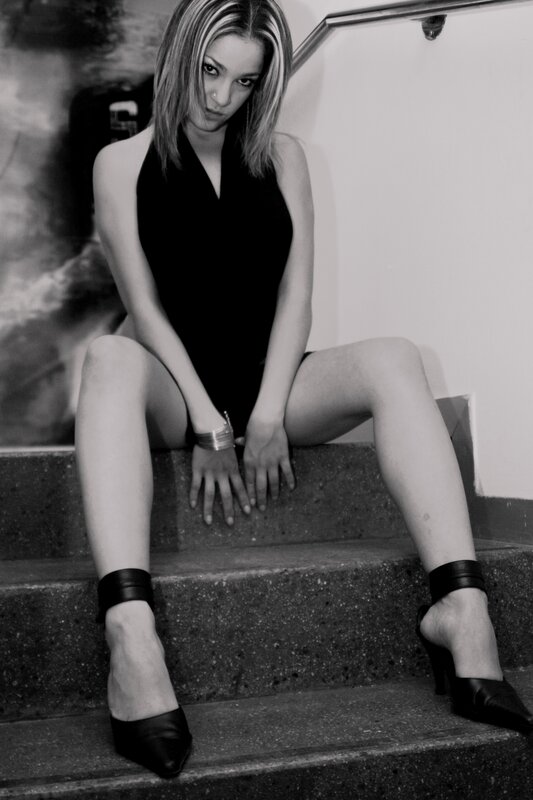 woman sitting on stairs