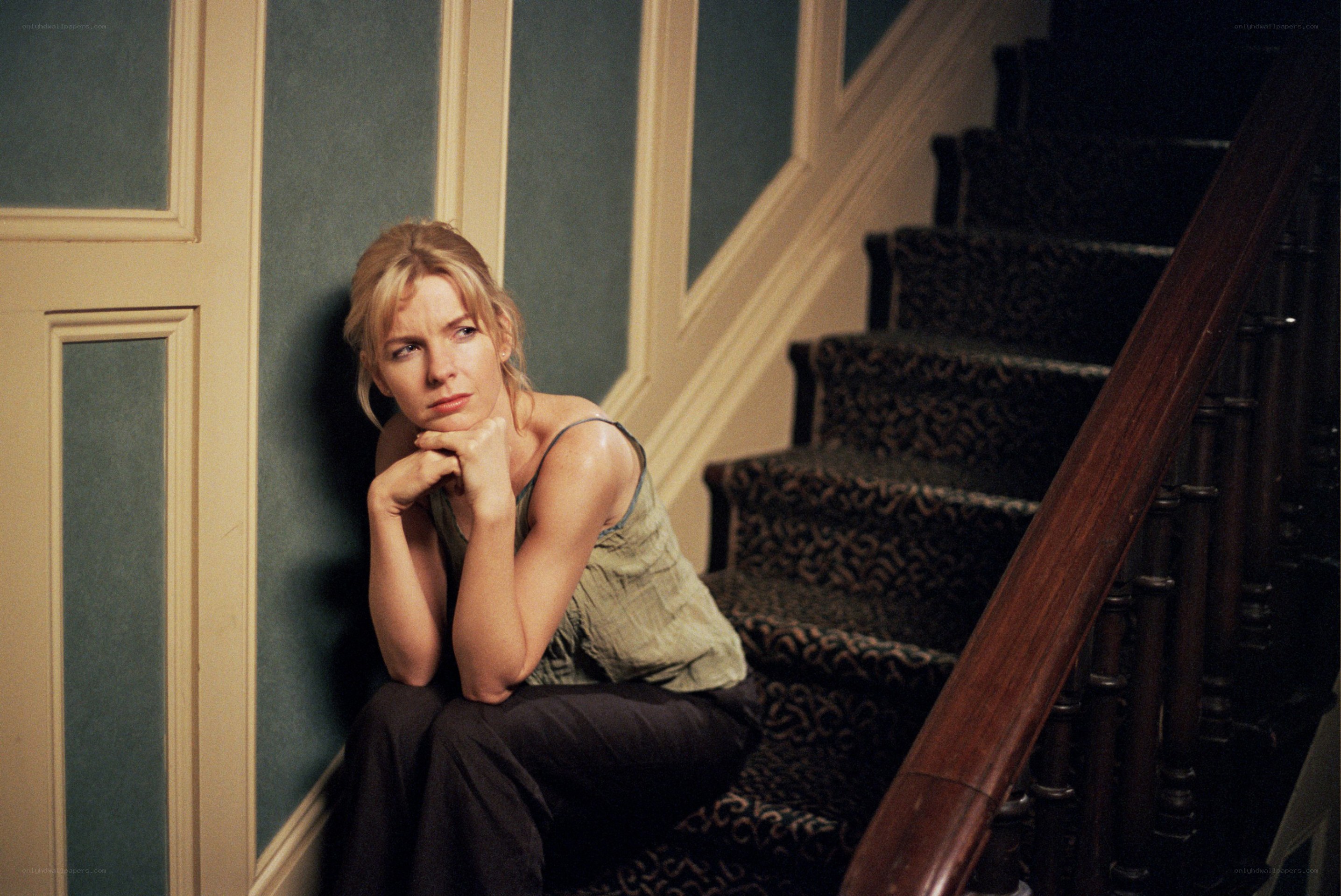 woman sitting on stairs