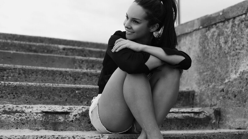 woman sitting on stairs