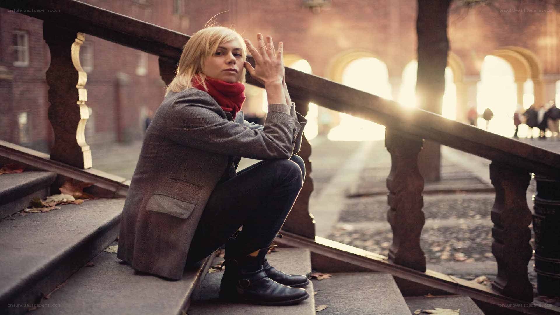 woman sitting on stairs