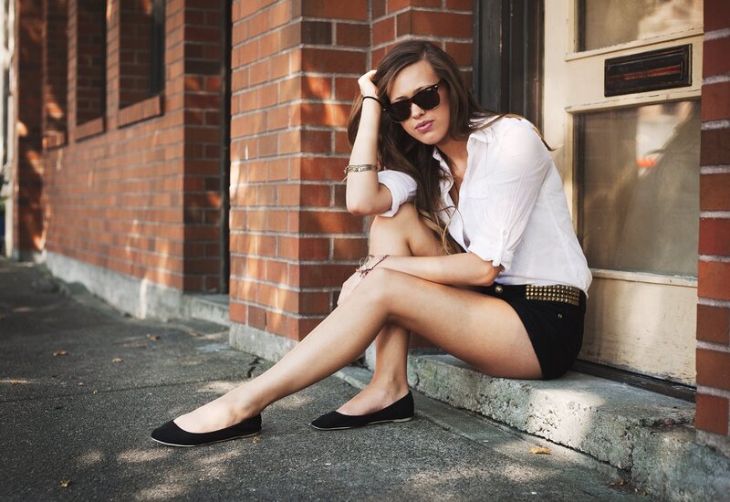 Woman Sitting on Step — Black, Relaxed, Afternoon