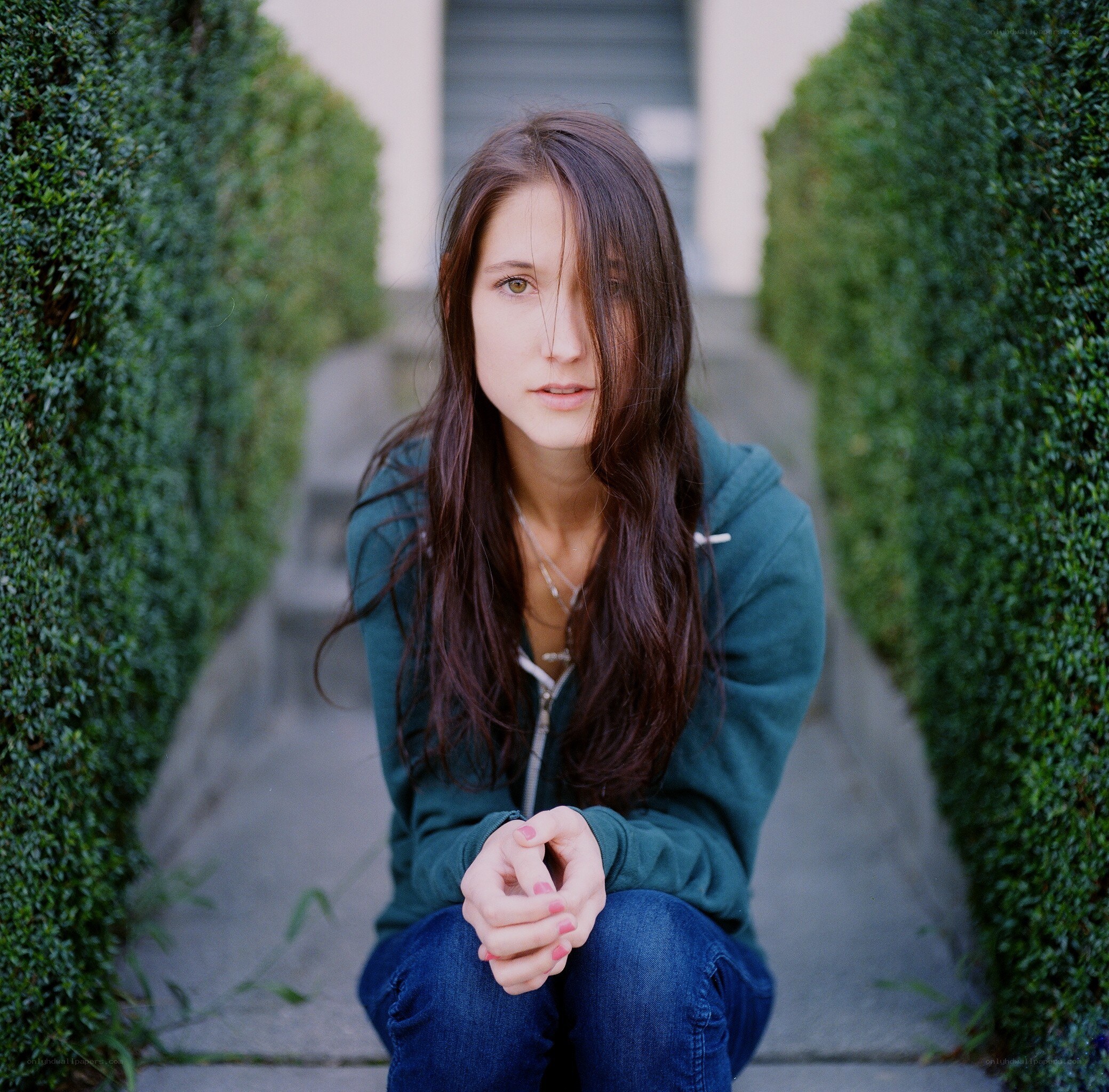 woman sitting on steps
