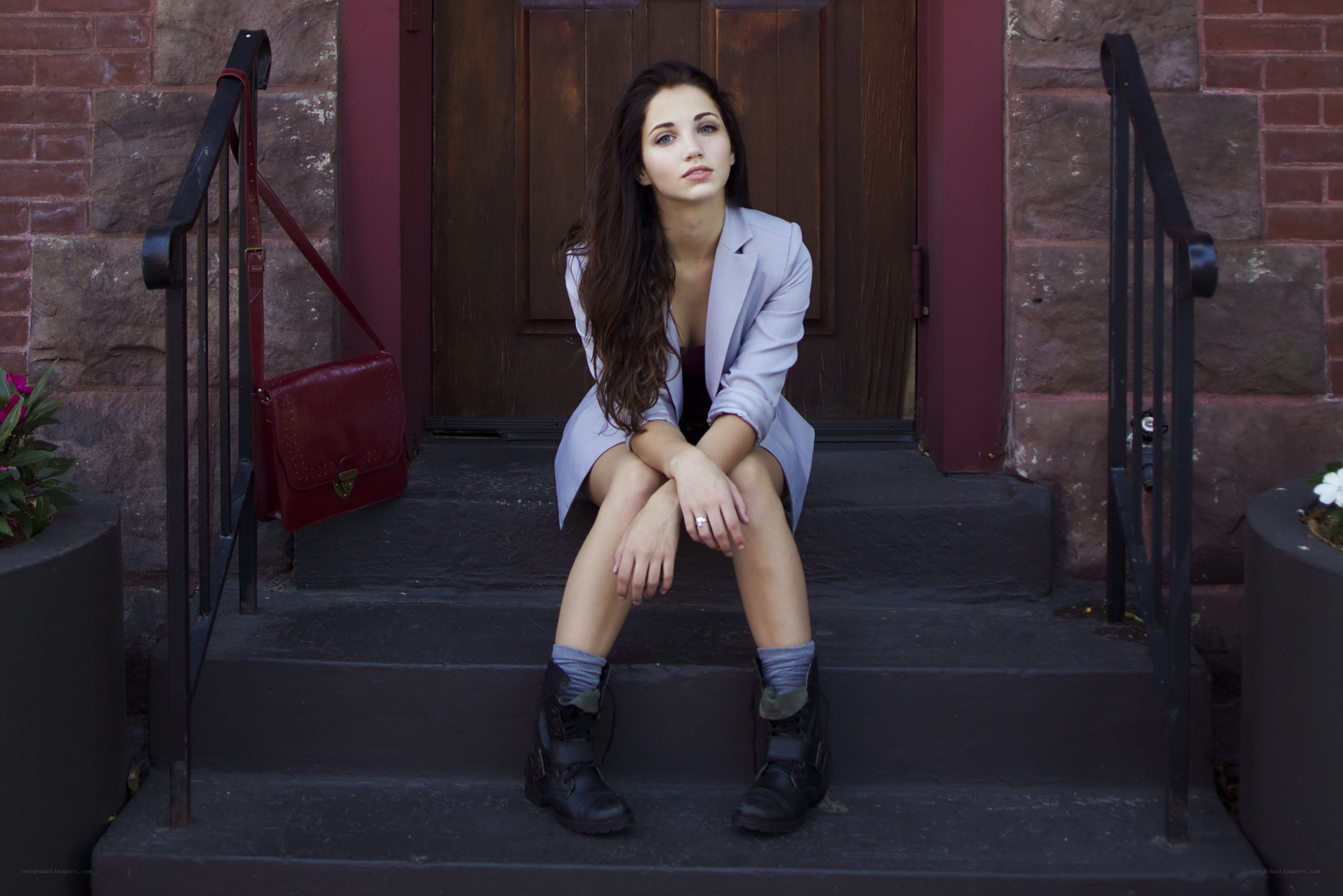 woman sitting on steps