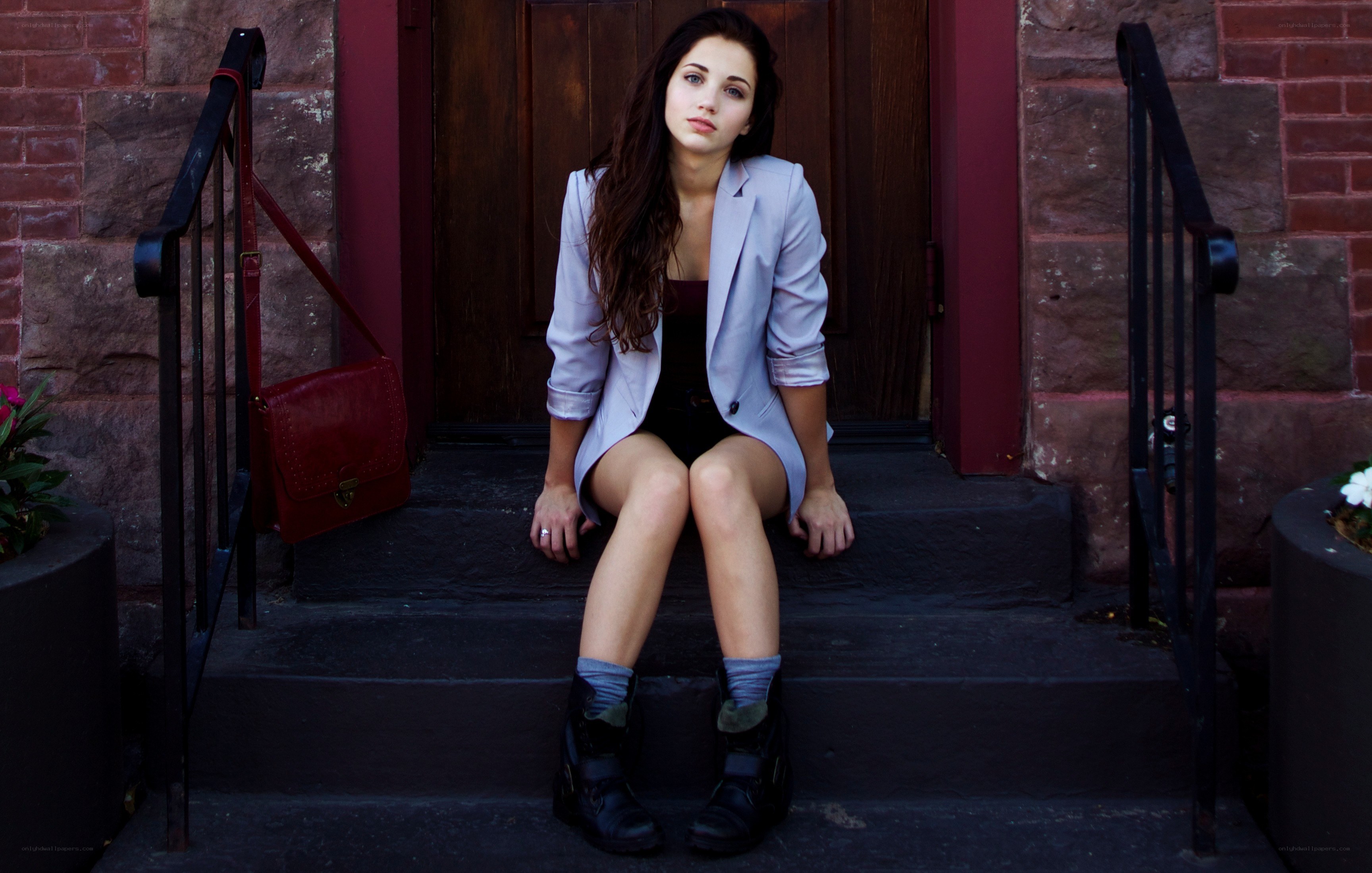 woman sitting on steps