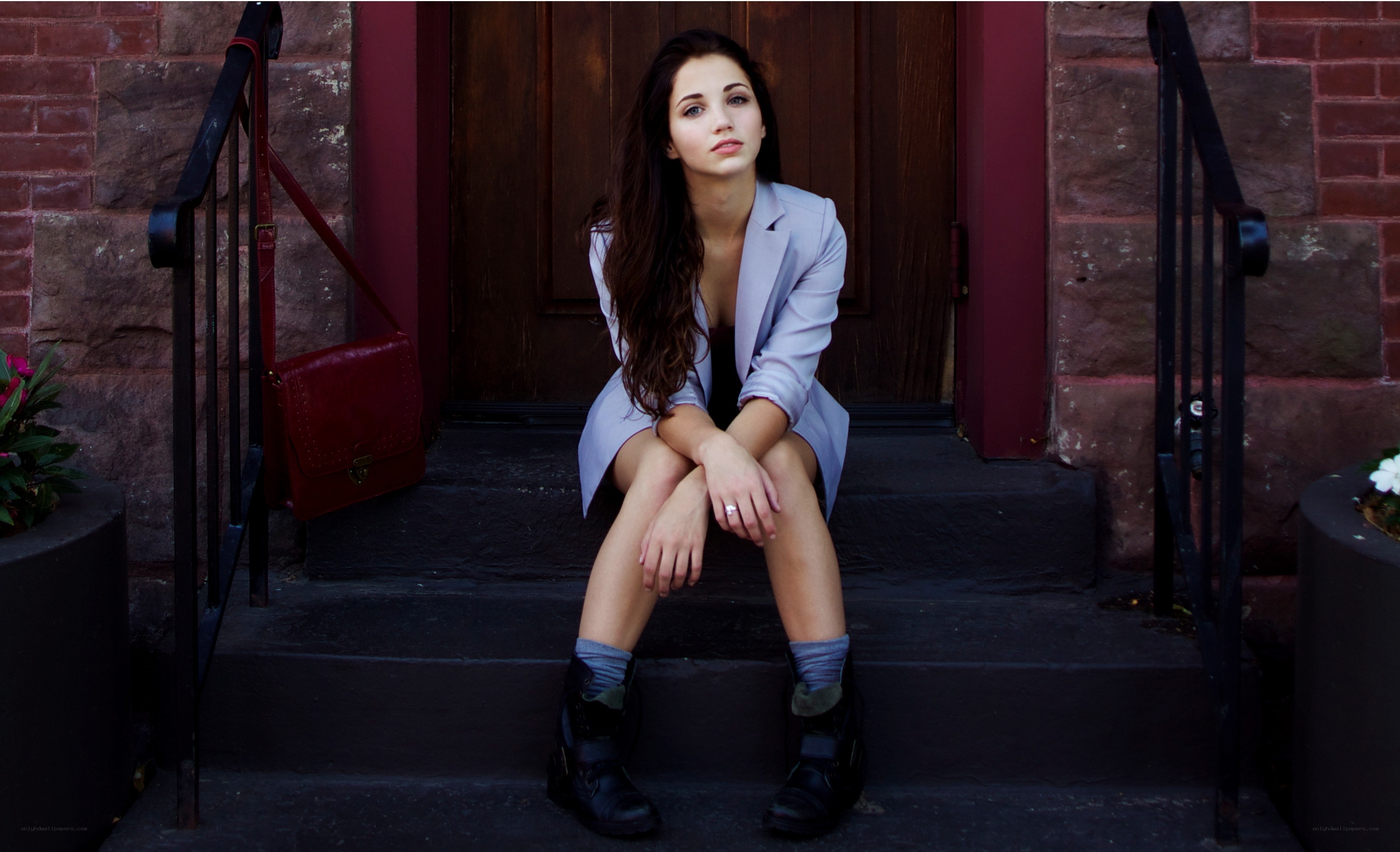 woman sitting on steps