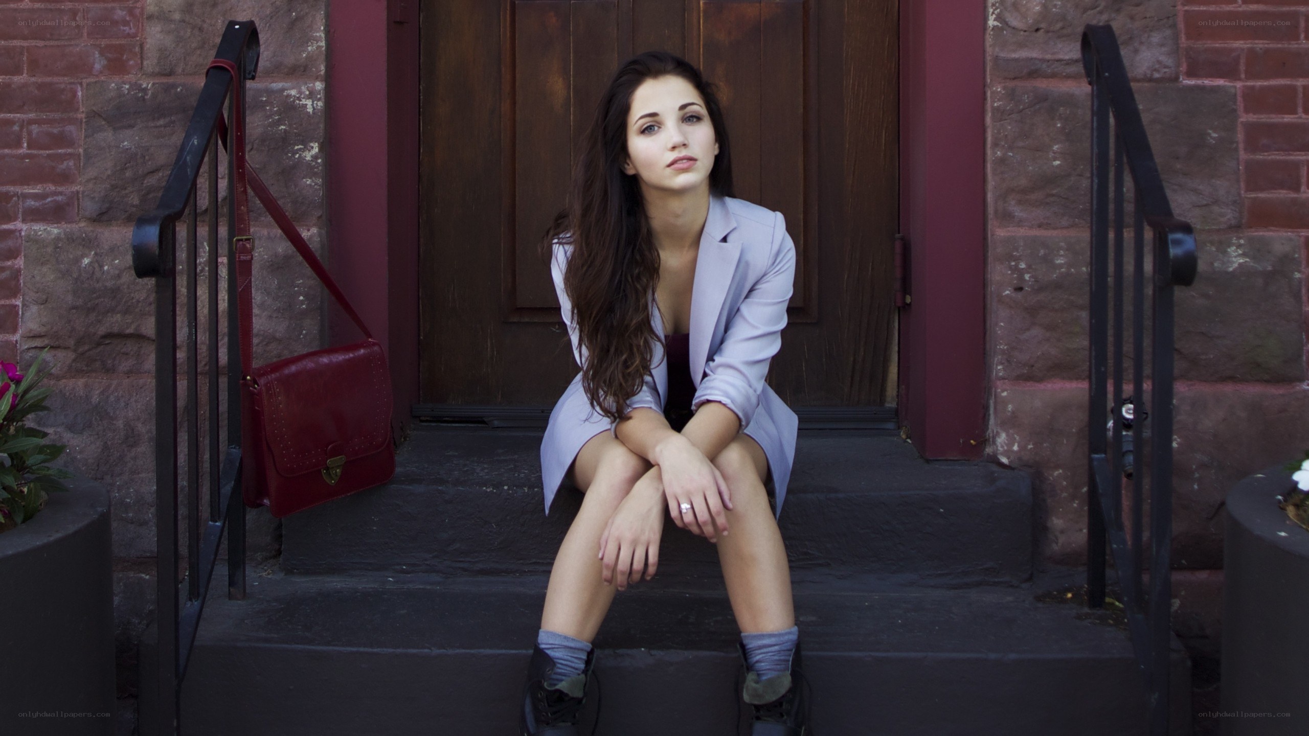 woman sitting on steps