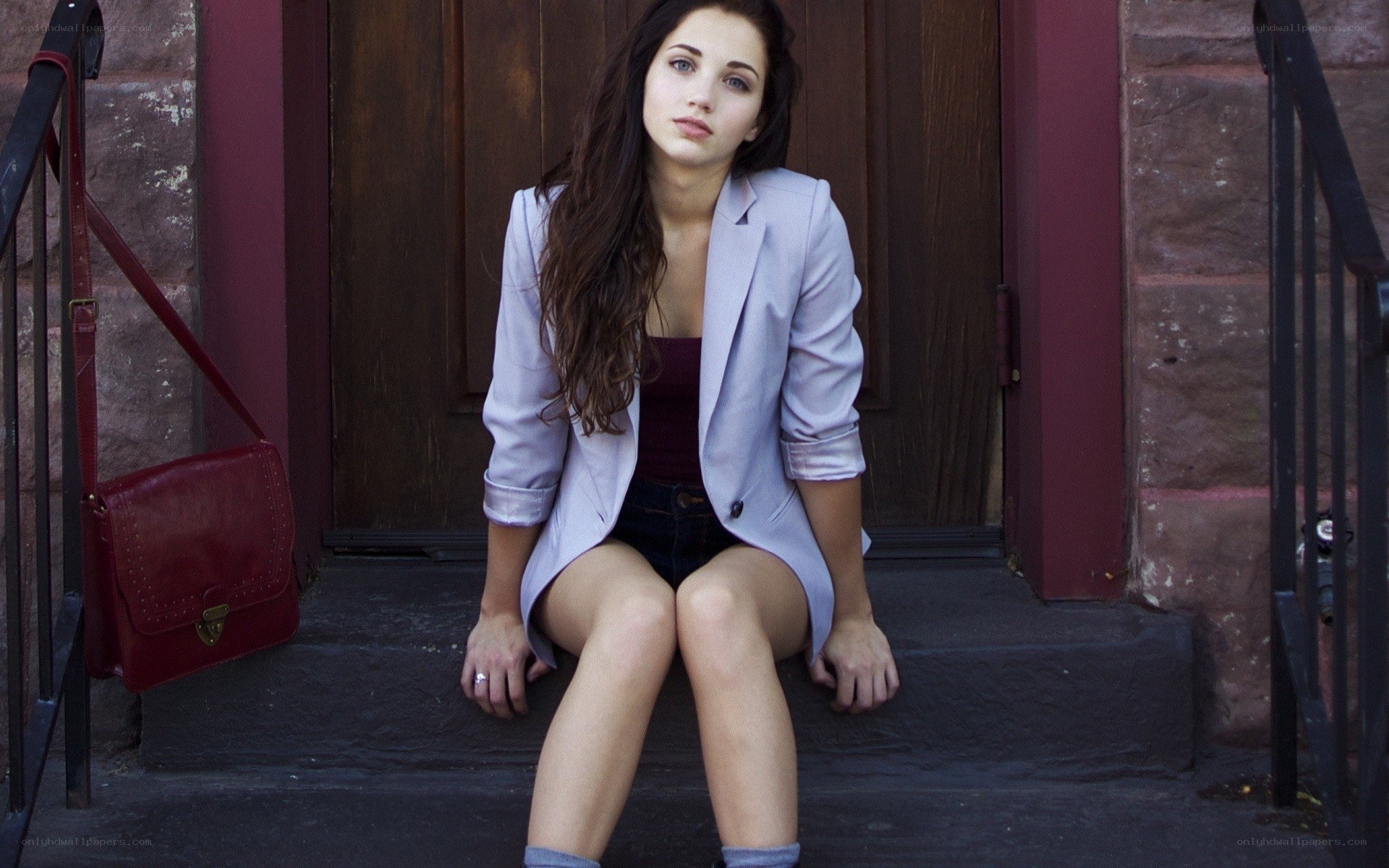 woman sitting on steps