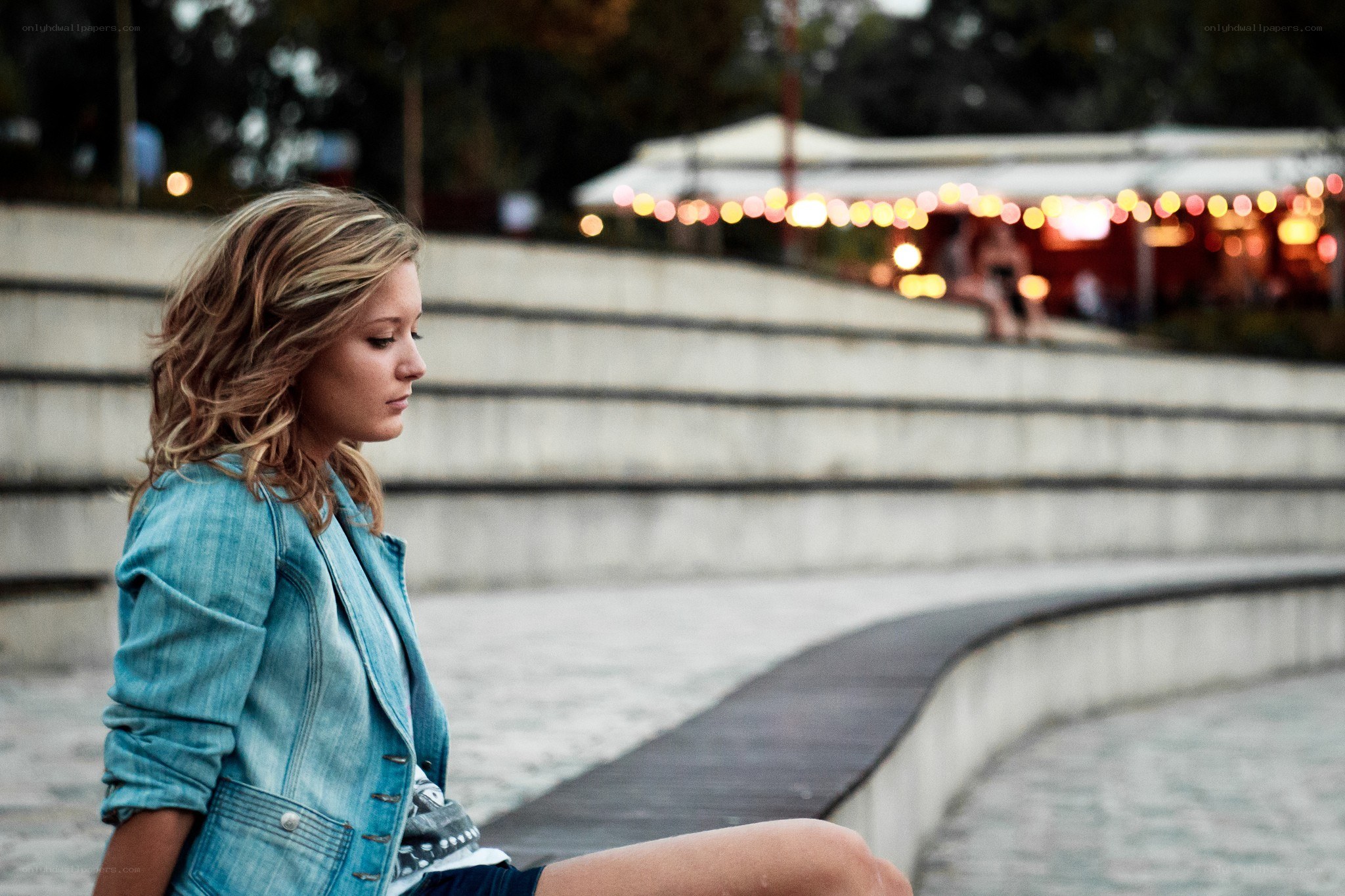 woman sitting on steps