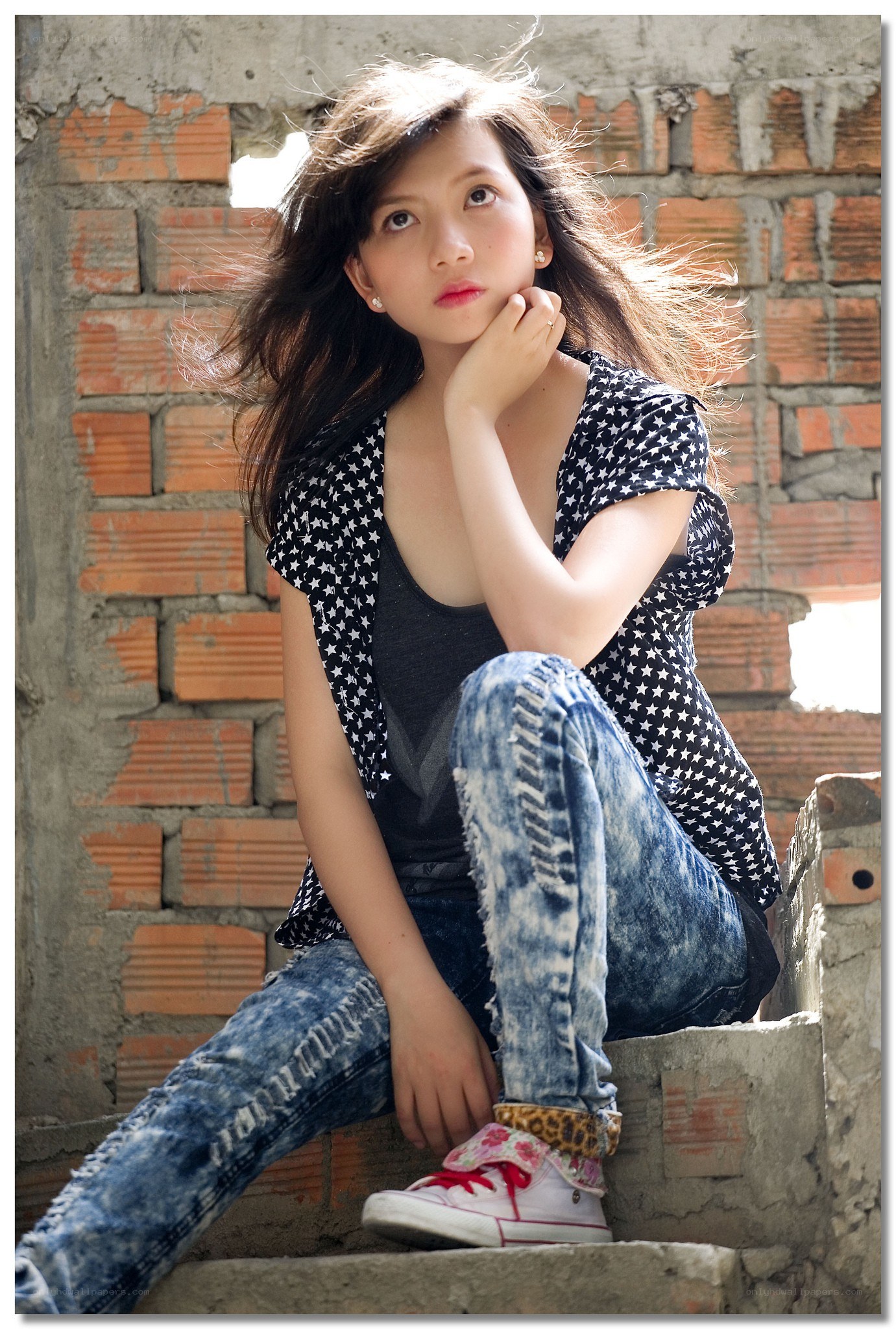 woman sitting on steps