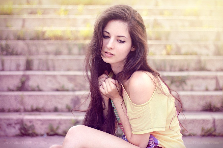 woman sitting on steps