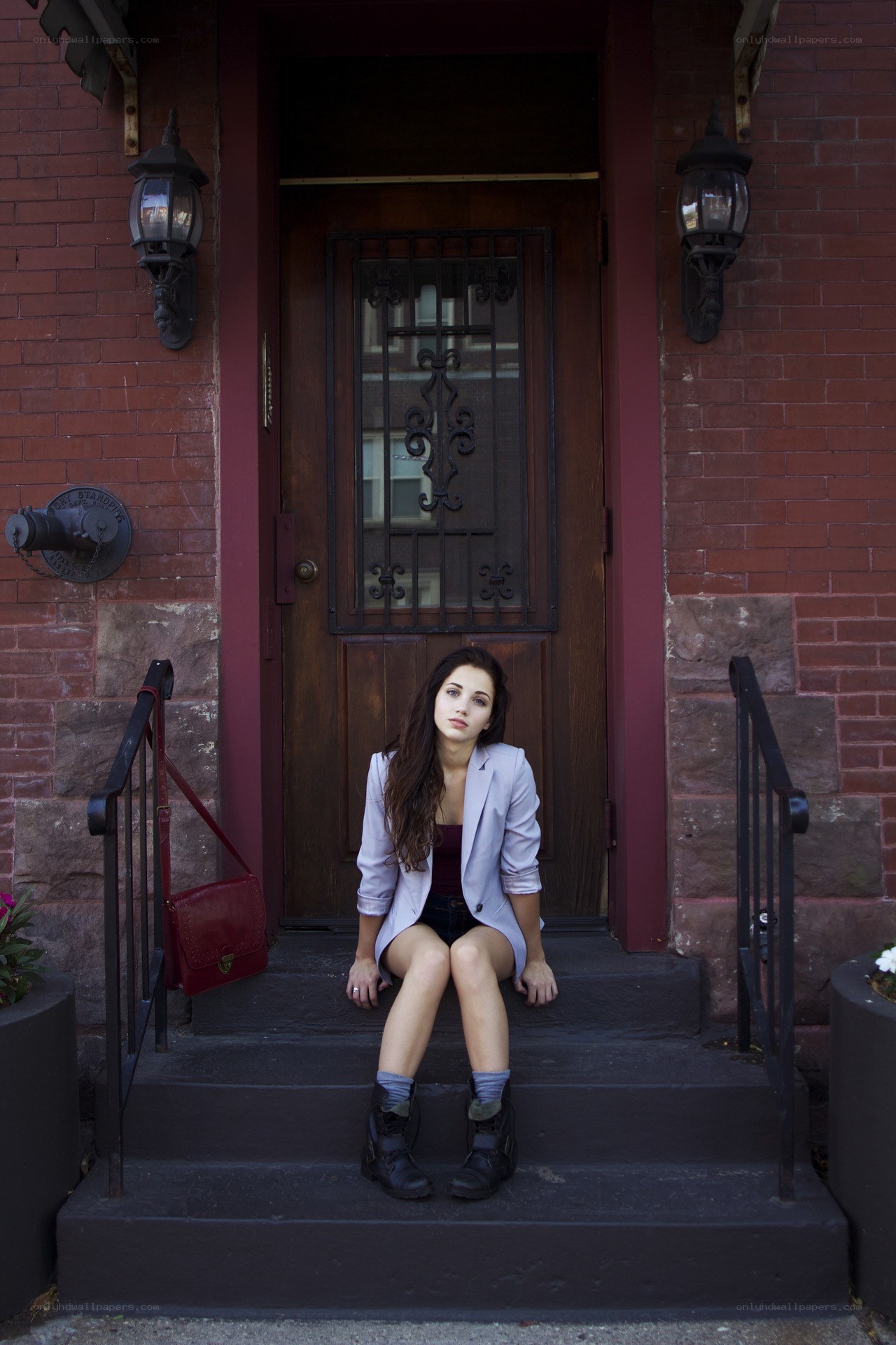 woman sitting on steps