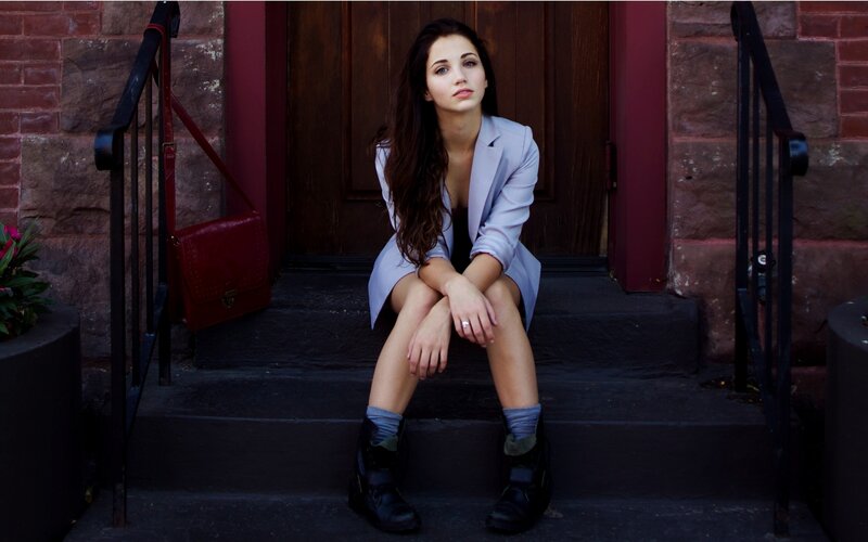 woman sitting on steps