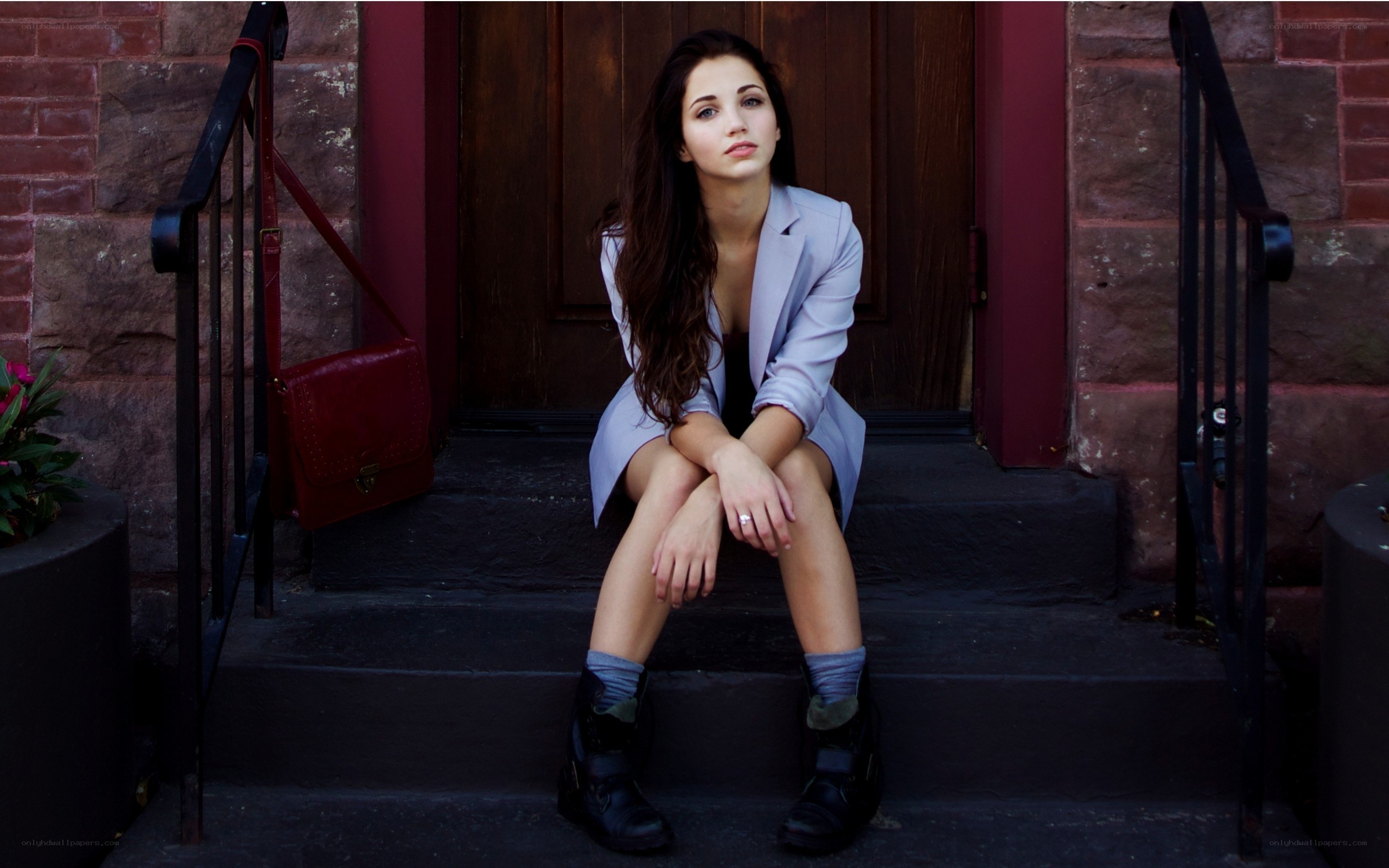 woman sitting on steps