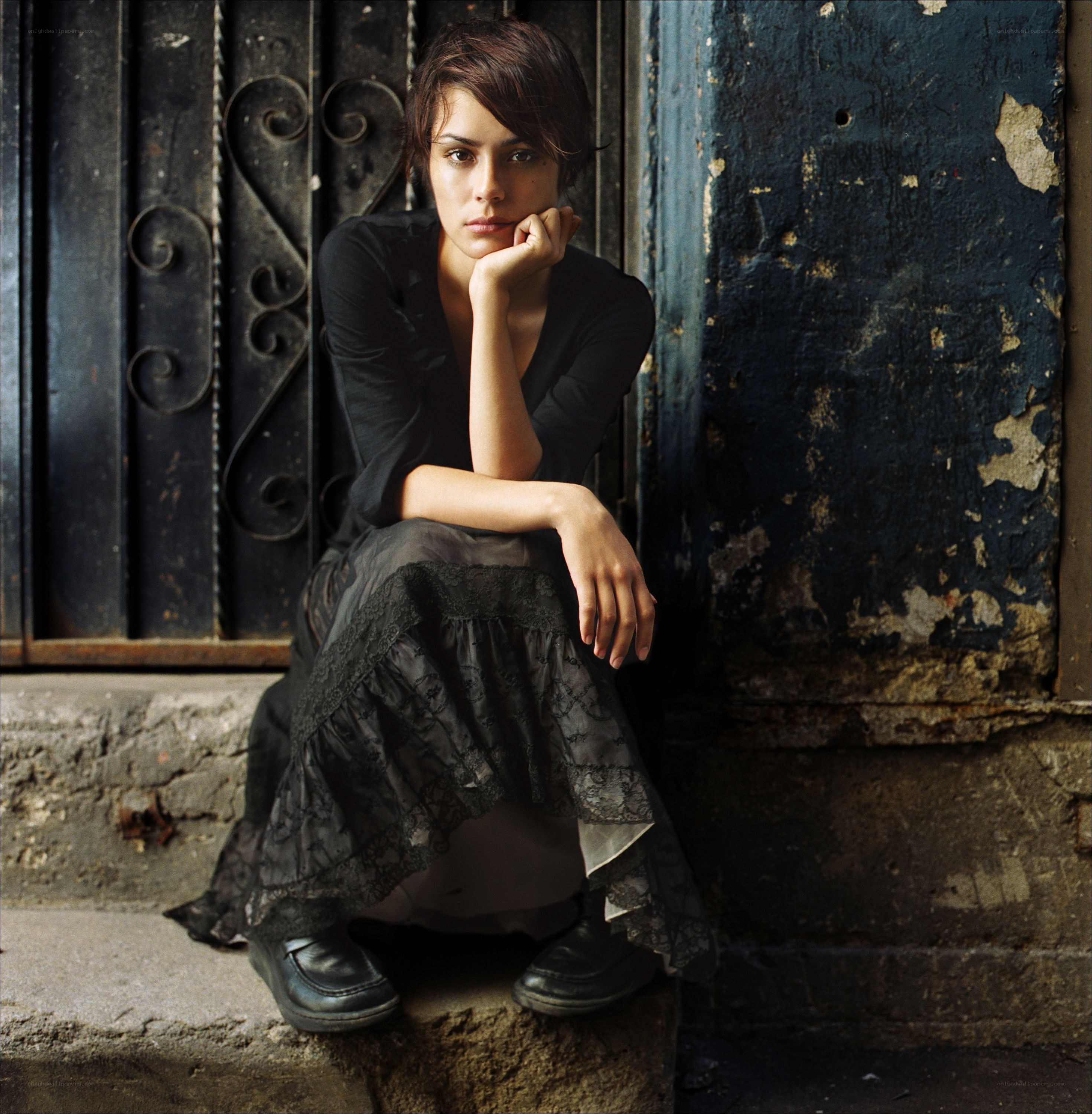 woman sitting on steps