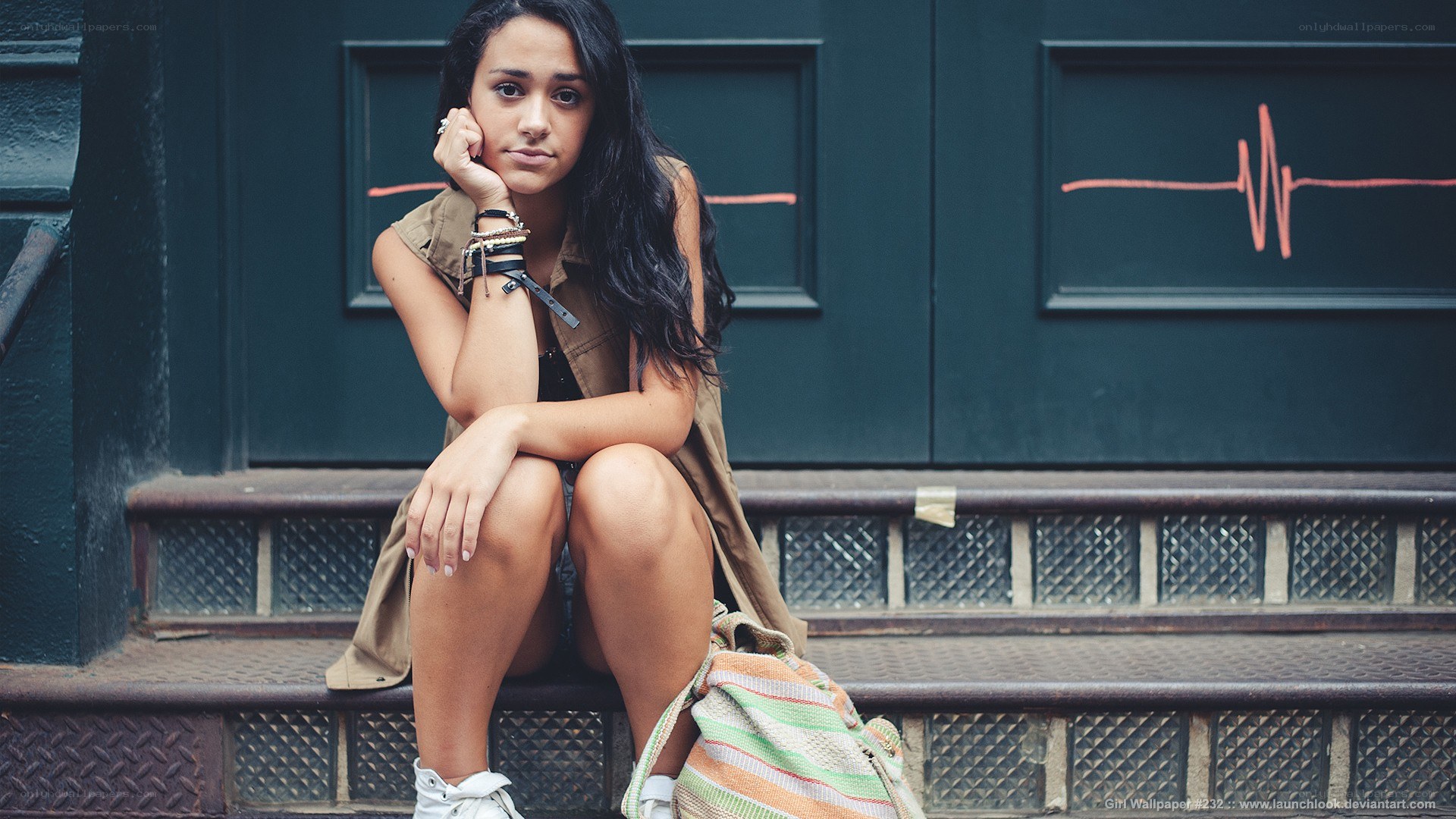 woman sitting on steps