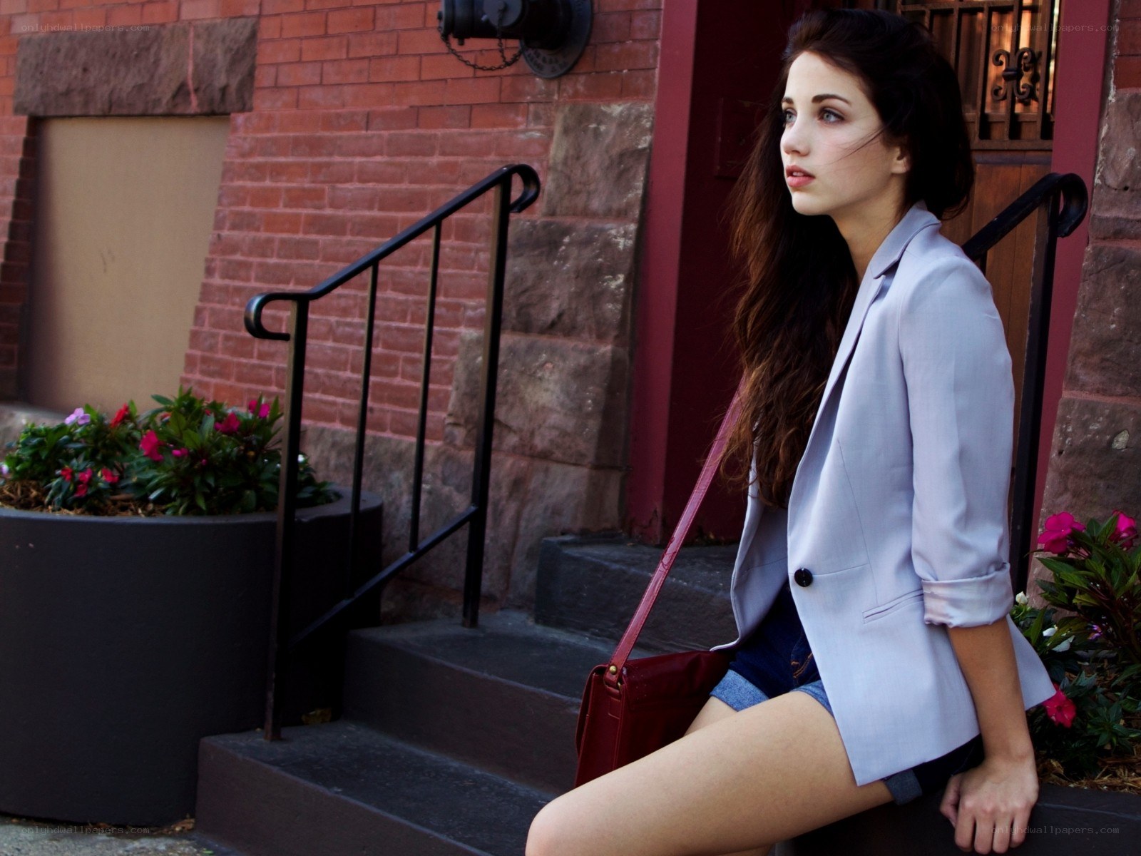 woman sitting on steps