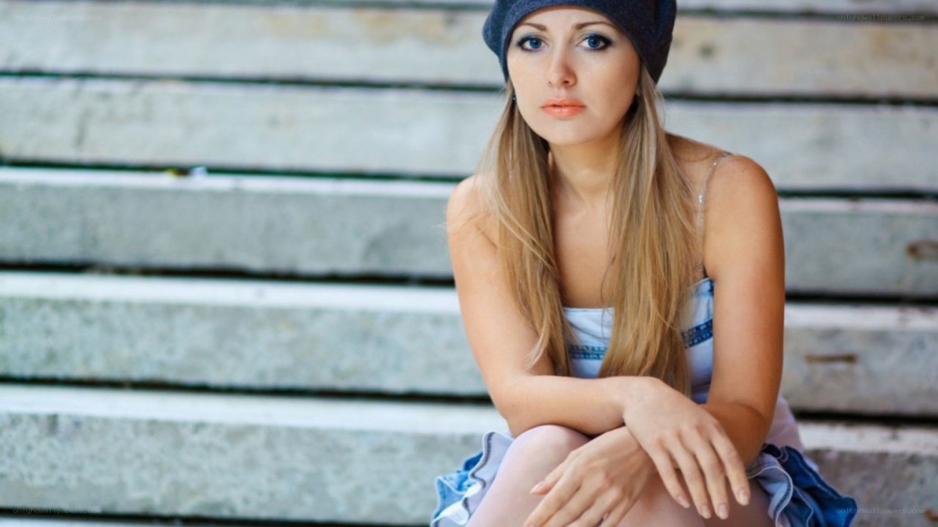 woman sitting on steps