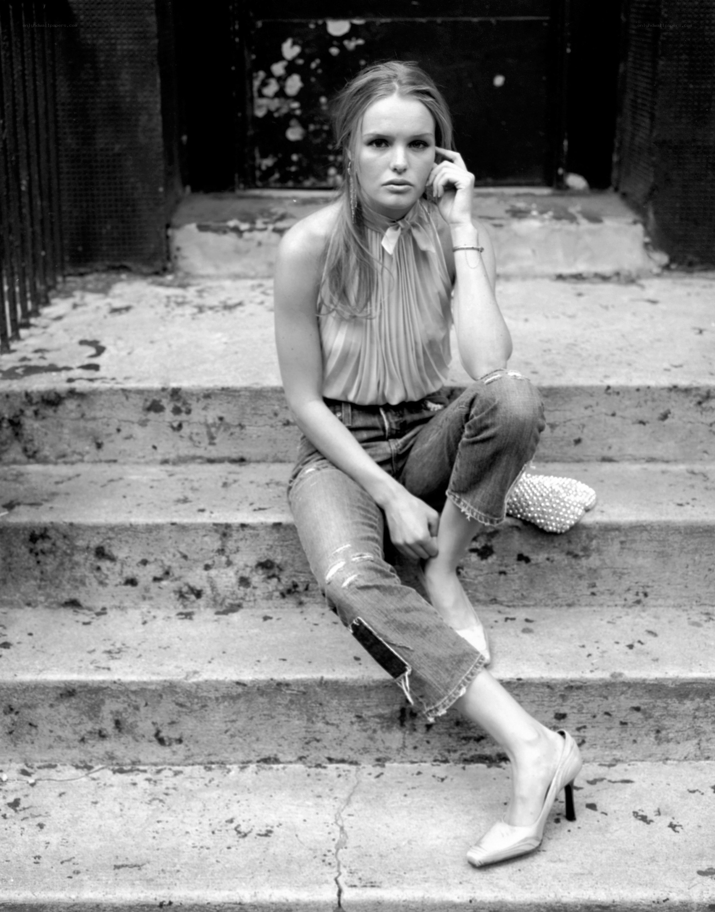 woman sitting on steps