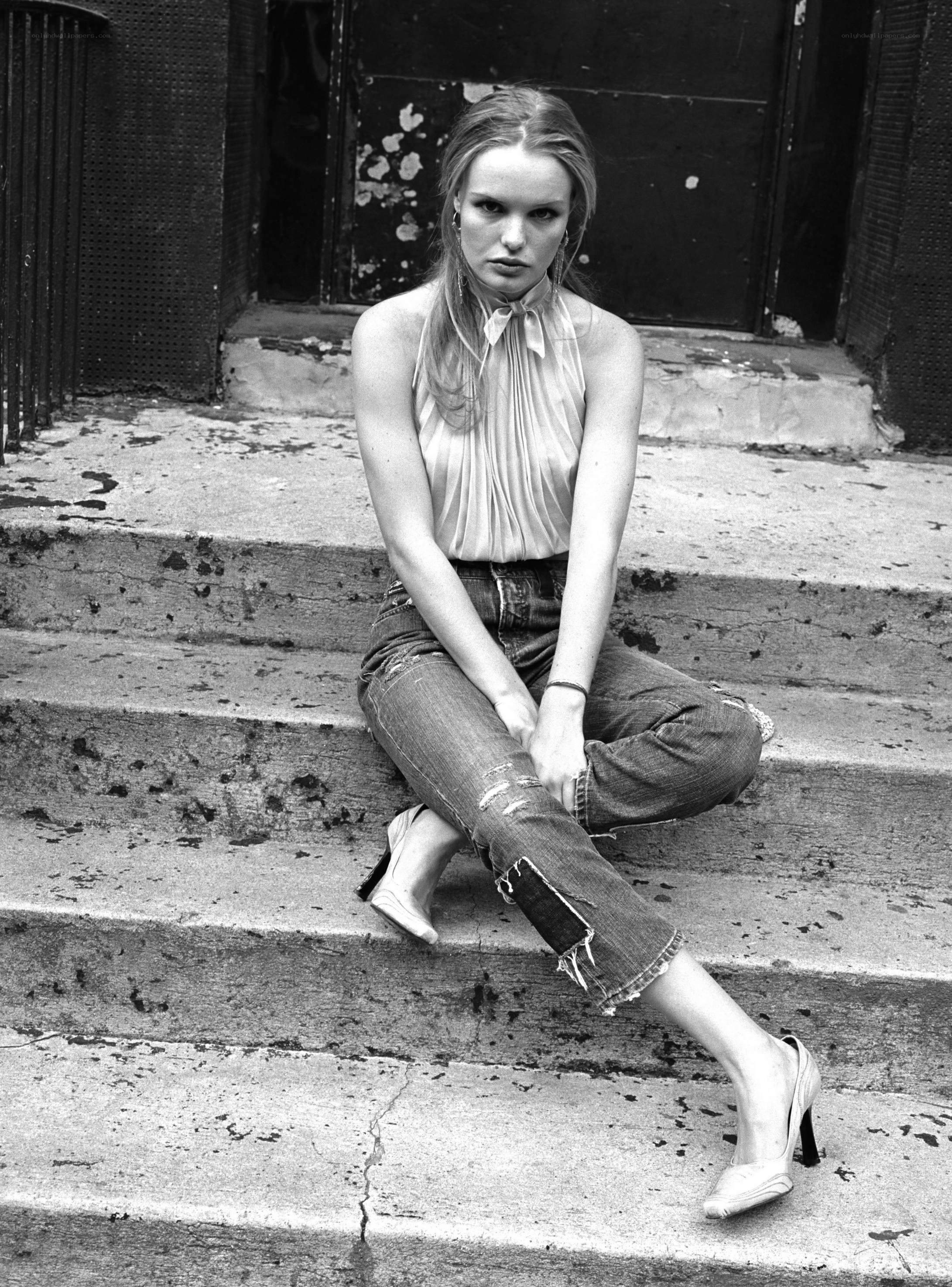 woman sitting on steps