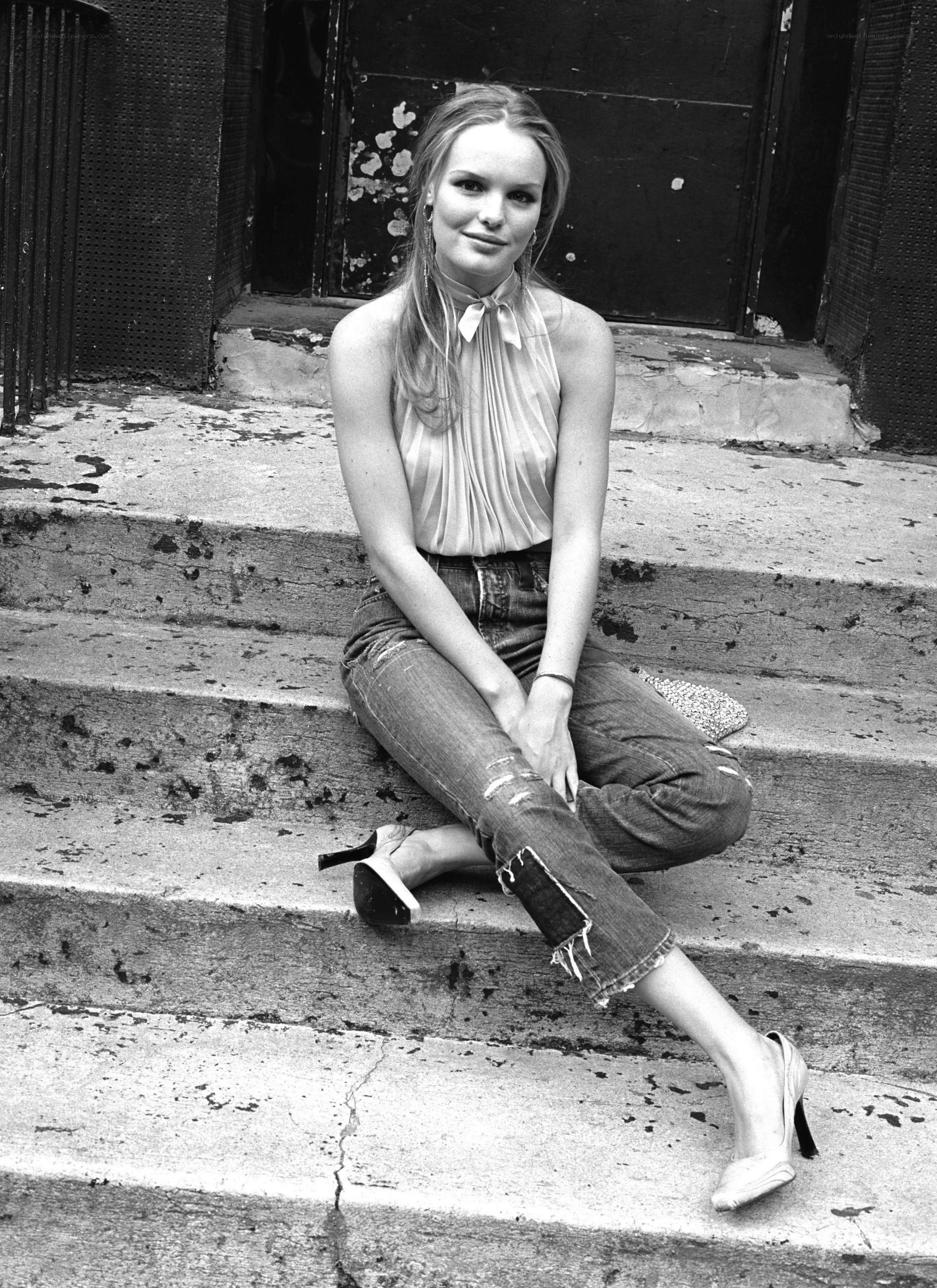 Woman sitting on steps