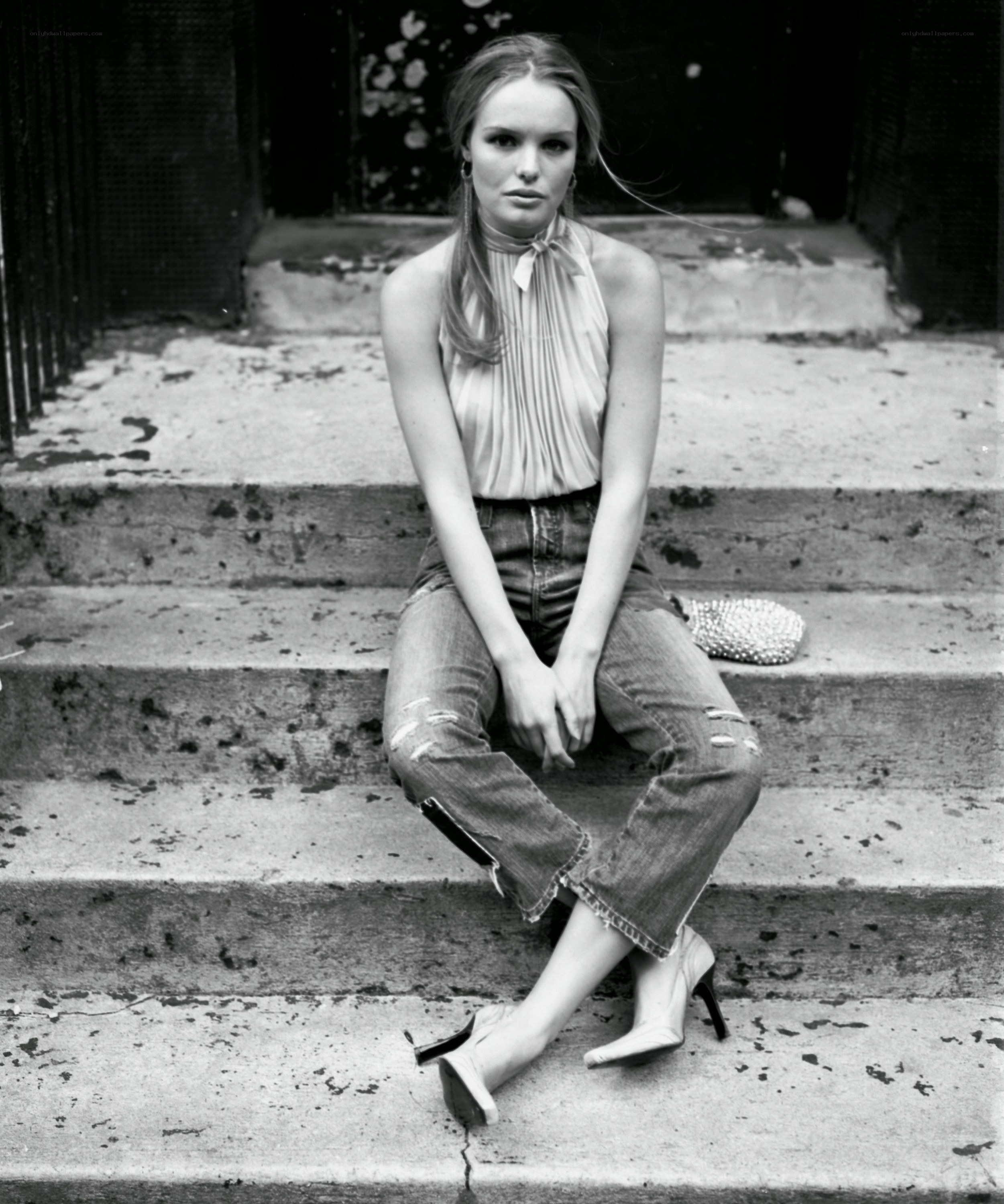 woman sitting on steps